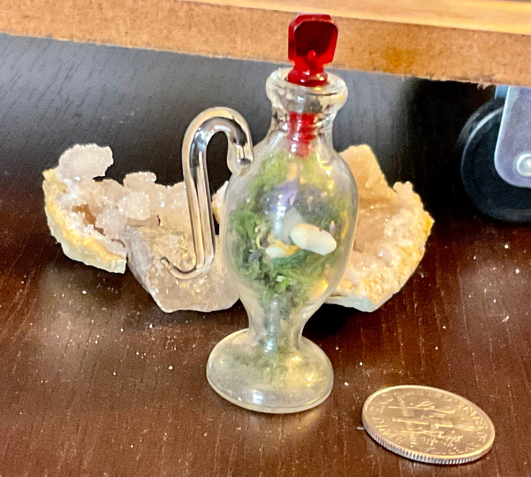 Antique Miniature Glass Amphora Diorama. Tiny Antique Glass Bottle with Animal Bones, Calendula and Cornflower.